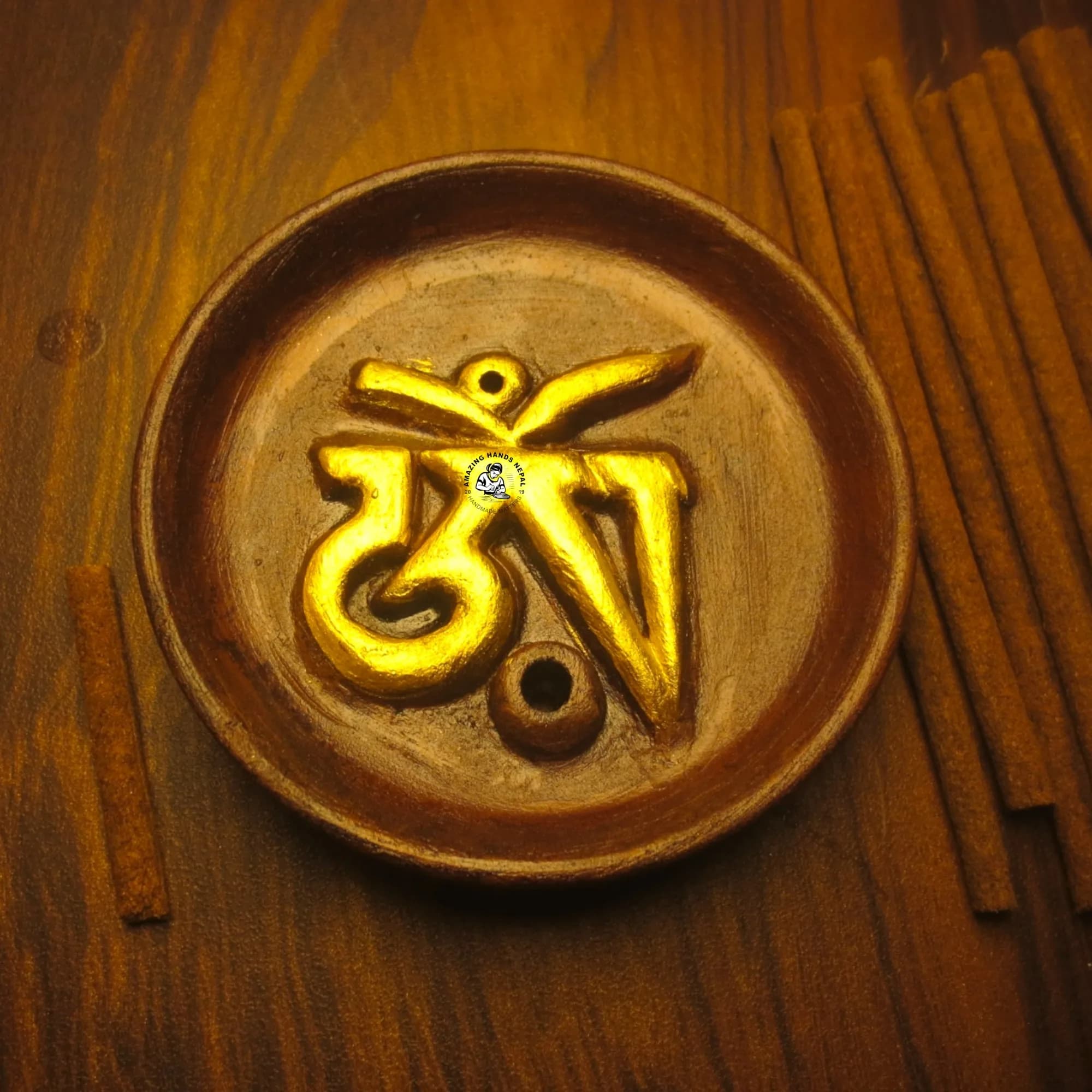 Golden Buddhist Om Incense Holder
