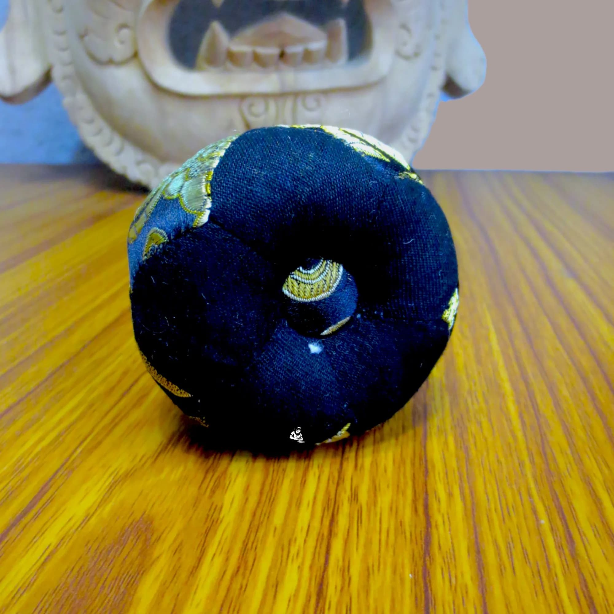 Patched Black Singing Bowl Cushion